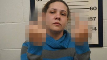 New Jersey woman accused of burglary flips bird in mugshot