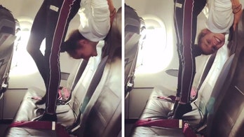Gymnast performs contortionist feat in tight airline seat