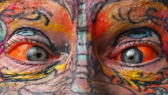 Washington state lawmakers looking to ban eyeball tattoos