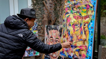 Vietnam artist paints 'peace' portraits of Trump, Kim for Hanoi summit
