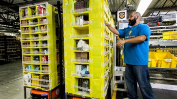 Amazon workers get high-tech belts to keep them safe among warehouse robots