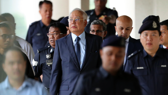 The Latest: Malaysian ex-leader's graft trial delayed