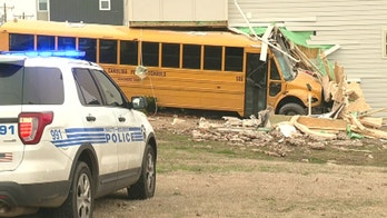 School bus crashes into North Carolina building, minor injuries reported
