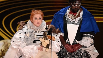 Oscars presenter Melissa McCarthy spoofs 'The Favourite' with bunny-covered outfit