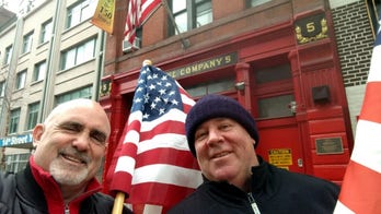 Retired 9/11 first responders honor vandalized American flag in New York City