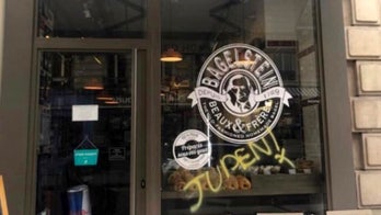 Anti-Semitic graffiti sprayed on Paris bagel shop compared to similar acts in Nazi Germany
