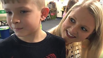 South Carolina teacher sees student, 7, riding bike on highway, helps him save dad
