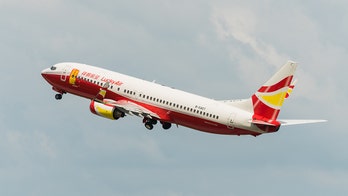 Airline pressing charges after passenger throws coins into plane engine for 'good luck'