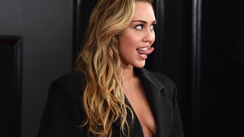Miley Cyrus risks wardrobe malfunction multiple times at Grammys