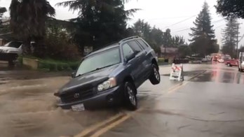 'Atmospheric river' bringing threat of mudslides, flooding to California