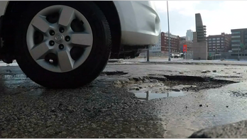 Scientists hope bacteria could be the cure for potholes