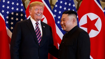 Trump shakes hands with North Korea’s Kim Jong Un at start of Hanoi summit