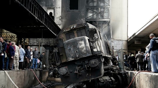 Dozens killed in fire at Cairo train station triggered by two conductors fighting