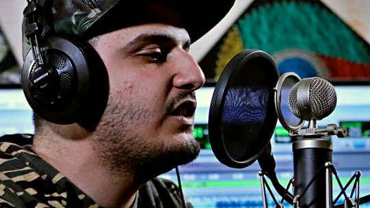 Iraqi rapper gives angry youth in city of Basra music outlet