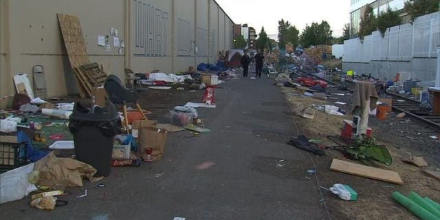 Piles of debris awaited cleanup at an "Occupy ICE" camp in Portland, Oregon, after police cleared out protesters earlier this week. (KPTV-TV/FOX 12)