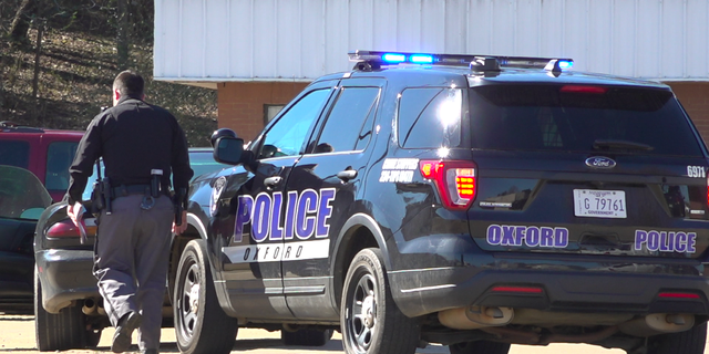 An Oxford police officer stops a motorist.
