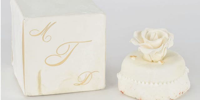 The 14-year-old sweet for sale comes packaged in its original ivory box, stamped with a gold monogram “MDT.”