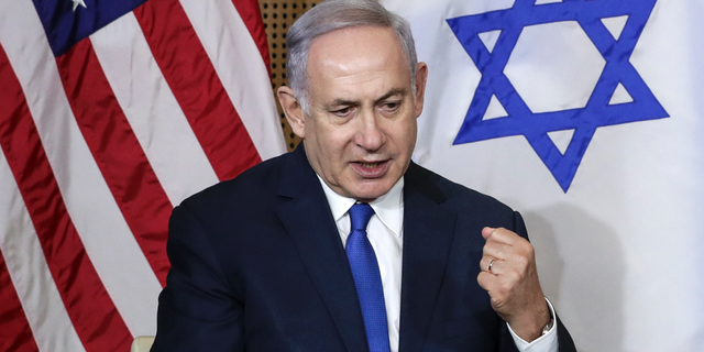 Israeli Prime Minister Benjamin Netanyahu reacts during a bilateral meeting with United States Vice President Mike Pence in Warsaw, Poland, Thursday, Feb. 14, 2019. The Polish capital is host for a two-day international conference on the Middle East, co-organized by Poland and the United States. (AP Photo/Michael Sohn)