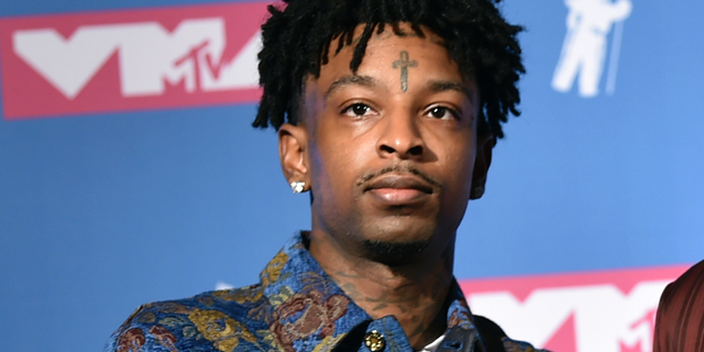 FILE - In this Aug. 20, 2018, file photo, 21 Savage poses in the press room at the MTV Video Music Awards at Radio City Music Hall in New York. A lawyer for 21 Savage says Wednesday, Feb. 13, 2019, that the Grammy-nominated rapper, whose given name is She'yaa Bin Abraham-Joseph, has been released on on $100,000 bond from the Irwin County Detention Center in Ocilla, Ga. (Photo by Evan Agostini/Invision/AP, File)