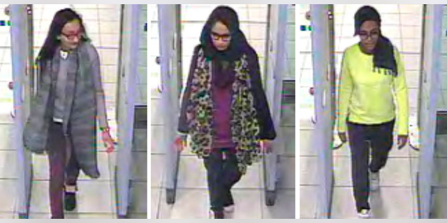 Metropolitan police released this image in 2015 of Kadiza Sultana, left, Shamima Begum, center, and Amira Abase going through security at Gatwick airport, south England, before catching their flight to Turkey.