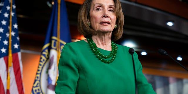 FILE - In this Dec. 20, 2018, Nancy Pelosi of California, talks to reporters at the Capitol in Washington. Democrats now own a stake in the state of the union. Members of the new House majority get to show off their new clout Feb. 5, 2019, when President Donald Trump delivers his first State of the Union address under divided government. (AP Photo/J. Scott Applewhite, File)