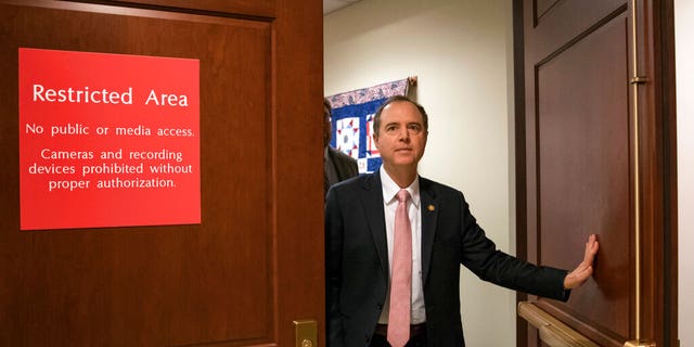 Rep. Adam Schiff, D-Calif., now ranking member of the House Intelligence Committee, exits a secure area to speak to reporters, on Capitol Hill last March. (AP Photo/J. Scott Applewhite)