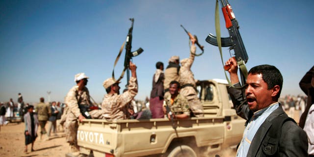 FILE - In this Jan. 3, 2017, file photo, tribesmen loyal to Houthi rebels chant slogans during a gathering aimed at mobilizing more fighters into battlefronts to fight pro-government forces, in Sanaa, Yemen. Moroccan government officials said last Thursday that Morocco has stopped taking part in military action with the Saudi-led coalition in Yemen’s war, and has recalled its ambassador to Saudi Arabia. (AP Photo/Hani Mohammed, File)