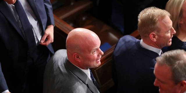 Acting Attorney General Matthew Whitaker, center, acting Secretary of Defense Patrick Shanahan, right, and members of President Donald Trump's cabinet at the State of the Union address Tuesday night. (AP Photo/Andrew Harnik)