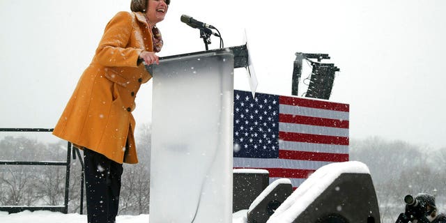 Democratic Sen. Amy Klobuchar addresses a snowy rally where she announced she is entering the race for president Sunday, Feb. 10, 2019, at Boom Island Park in Minneapolis. (AP Photo/Jim Mone)