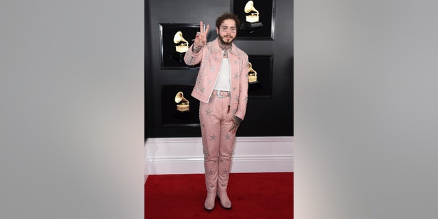 Post Malone arrives at the 61st annual Grammy Awards at the Staples Center on Sunday, Feb. 10, 2019, in Los Angeles.