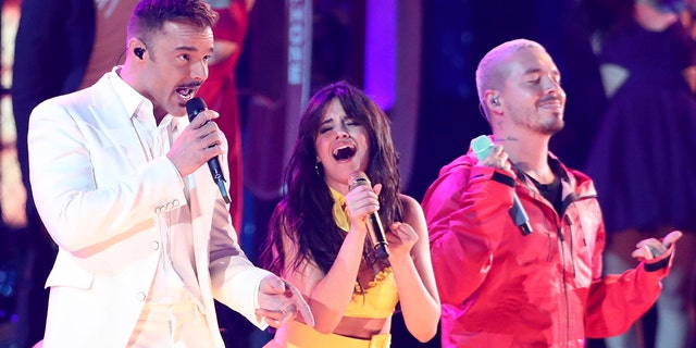 Ricky Martin, from left, Camila Cabello and J Balvin perform "Havana" at the 61st annual Grammy Awards on Sunday, Feb. 10, 2019, in Los Angeles.