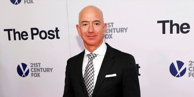FILE - In this Dec. 14, 2017, file photo, Jeff Bezos attends the premiere of "The Post" at The Newseum in Washington. Private investigators working for Bezos have determined the brother of the Amazon CEO’s mistress leaked the couple’s intimate text messages to the National Enquirer. That’s according to a person familiar with the matter who spoke Monday to The Associated Press. (Photo by Brent N. Clarke/Invision/AP)