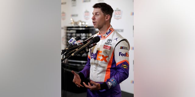 Denny Hamlin answers questions at the NASCAR Daytona 500 Motorcycle Media Day at Daytona International Speedway on Wednesday, February 13, 2019, in Daytona Beach, Florida (Associated Press).