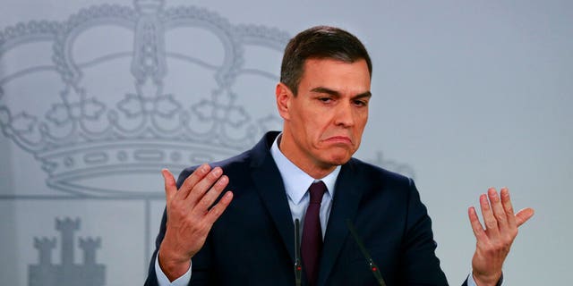 Spain's Prime Minister Pedro Sanchez delivers a statement at the Moncloa Palace in Madrid, Spain, Friday, Feb. 15, 2019. Sanchez has called early general elections for late April, the third such ballot in less than four years.