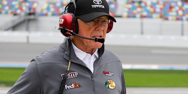 On this Sunday, February 10, 2019, the owner of the car, Joe Gibbs, wanders in the pits during qualifying for the Daytona 500 motor racing at Daytona International Speedway, in Daytona Beach, Florida (Associated Press).