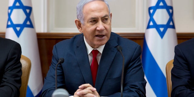 Israeli Prime Minister Benjamin Netanyahu chairs the weekly cabinet meeting at the Prime Minister's office in Jerusalem, Sunday, Feb. 17.