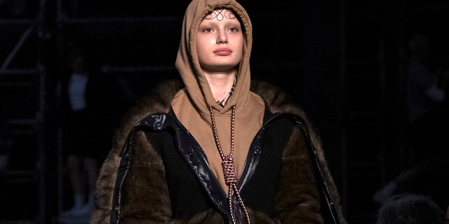 A model wears a creation from Burberry's "Tempest" collection at their autumn-winter runway show during London Fashion Week on Sunday.