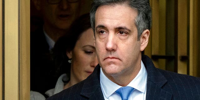 FILE - In this Dec. 12, 2018, file photo, Michael Cohen, President Donald Trump's former personal lawyer, leaves federal court after his sentencing in New York. Federal prosecutors have charged an IRS employee with leaking banking records of Cohen, the U.S. attorney's office in San Francisco said, Thursday, Feb. 21, 2019. (AP Photo/Craig Ruttle, file)