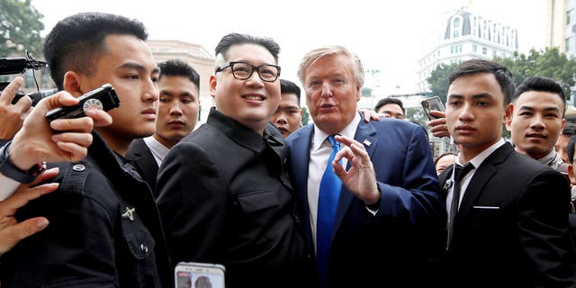 Donald Trump impersonator Russell White and Kim Jong Un impersonator Howard X in Hanoi, Vietnam, on Friday. (AP Photo/Minh Hoang)