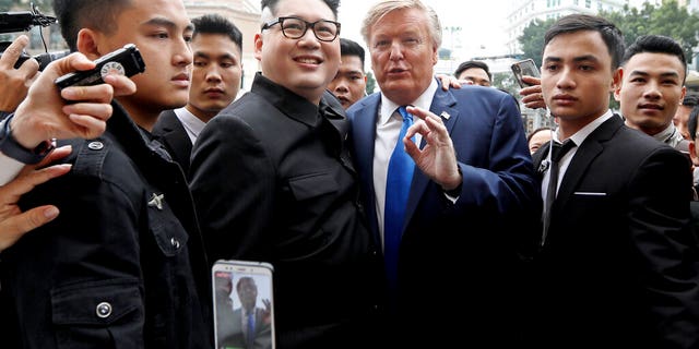 Donald Trump impersonator Russell White and Kim Jong Un impersonator Howard X in Hanoi, Vietnam, on Friday. (AP Photo/Minh Hoang)