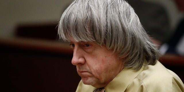 David Turpin sits in a courtroom Friday, Feb. 22, 2019, in Riverside, Calif. Turpin and his wife, Louise, who shackled some of their 13 children to beds and starved them pleaded guilty on Friday to torture and other abuse.