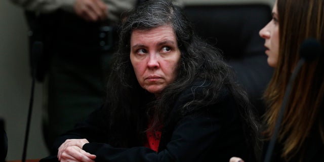 Louise Turpin sits in a courtroom Friday, Feb. 22, 2019, in Riverside, Calif. Turpin and her husband, David, who shackled some of their 13 children to beds and starved them pleaded guilty Friday to torture and other abuse.
