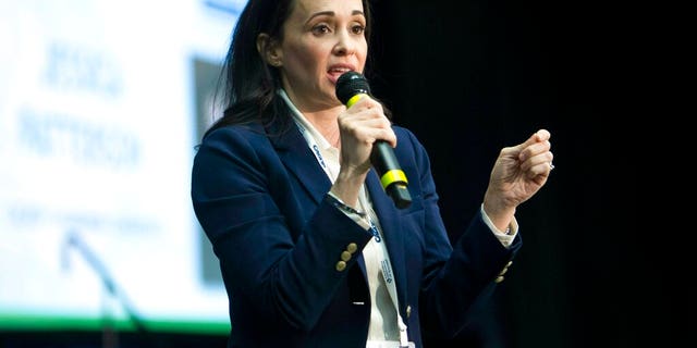 Jessica Patterson, candidate for chair of the California Republican Party, speaks to delegates after her nomination during the party convention in Sacramento, Calif., Saturday, Feb. 23, 2019. (AP Photo/Steve Yeater)