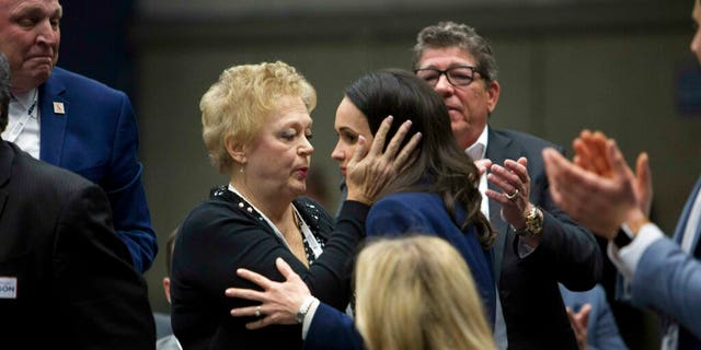 Jessica Patterson, right, shares a moment with her mother, Julie Millan, after being named president of the California Republican Party at their convention in Sacramento, California on Saturday, February 23, 2019. (AP Photo / Steve Yeater)