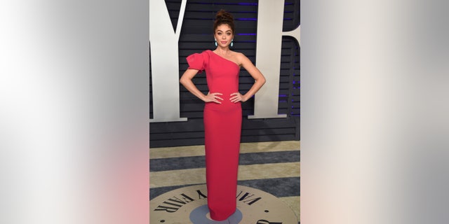 Sarah Hyland arrives at the Vanity Fair Oscar Party.