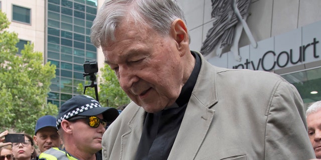 Cardinal George Pell leaves the County Court in Melbourne, Australia, Tuesday, Feb. 26, 2019. The most senior Catholic cleric ever charged with child sex abuse has been convicted of molesting two choirboys moments after celebrating Mass, dealing a new blow to the Catholic hierarchy's credibility after a year of global revelations of abuse and cover-up. (AP Photo/Andy Brownbill)