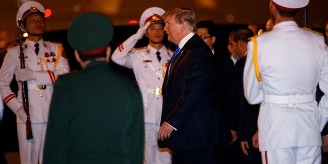 President Donald Trump arrives at Noi Bai Airport before a summit with North Korean leader Kim Jong Un.