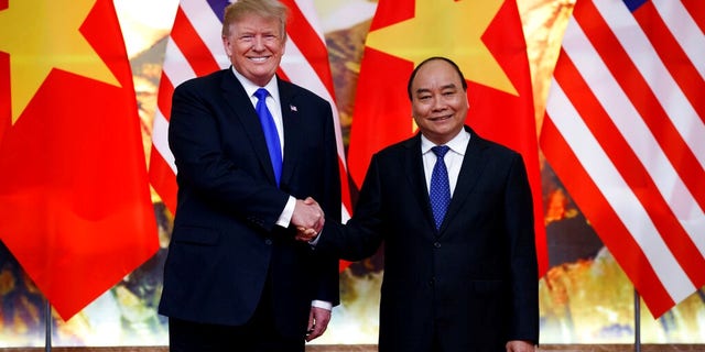 President Donald Trump meets with Vietnamese Prime Minister Nguyen Xuan Phuc at the Office of Government Hall.