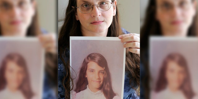 Hundreds of leaders and volunteers within Southern Baptist churches nationwide have been accused of sexual misconduct. Debbie Vasquez is pictured holding a photo of herself at age 14, when she said her pastor first molested her.