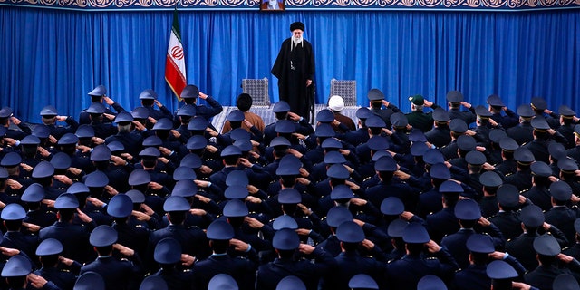 On this image, which was published by an official website of the Iranian Supreme Leader's Office, Supreme Leader Ayatollah Ali Khamenei is standing as Air Force Army Welcoming Staff at the beginning of their meeting in Iran's Tehran on Friday, February 8, 2019. Khamenei defended